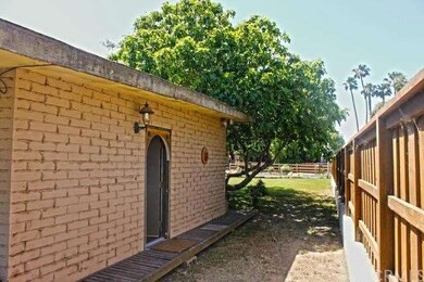 entrance to studio apartment on side of house