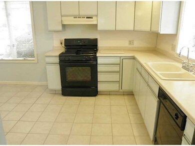 Kitchen. Bright & Sunny with New Corian Countertops New Tile Floor, New Faucet!
