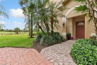 Doorway to property with a yard