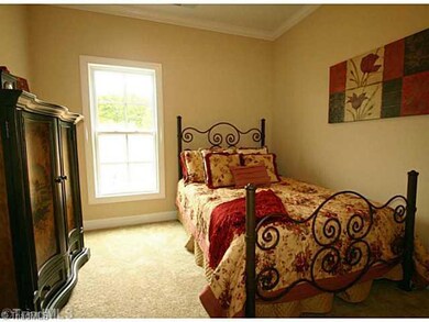 3rd Bedroom. Nice bedroom with view of side yard.
