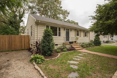 Ranch-style home with a front lawn