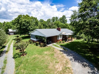 Ranch home built in 1963 with three bedrooms, one full bath and one half bath located in the master bedroom.
