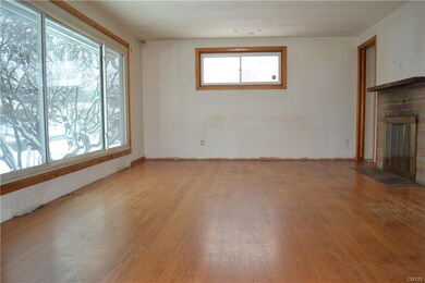 Hardwood floors, new windows and wood burning fire
