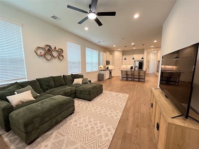 Living Room- High Ceilings, Tile Floors & Open Con