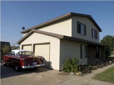 2-car attached garage with huge driveway.