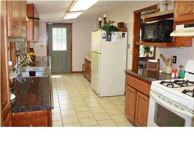 2010 - Kitchen remodel with all new tile flooring,