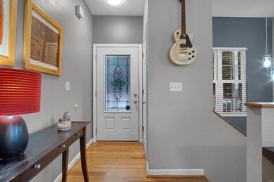 Entryway with coat closet.