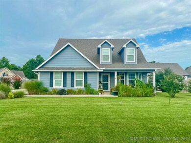 LANDSCAPED FRONT YARD WITH ROSES, CREPE MYRTLES, B