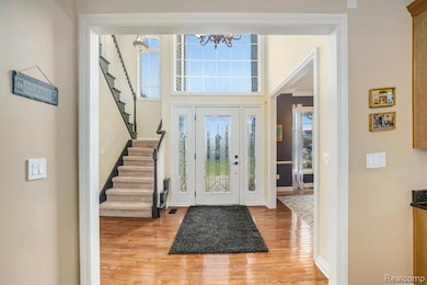 Entry Foyer with beautiful etched glass door.