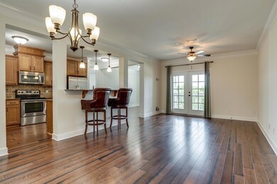 Spacious Family room / Dining area with bar and open to kitchen