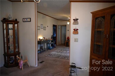 Dining Room, looking through Front Living Room, towards Bedrooms.