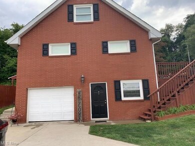 Front facade featuring garage
