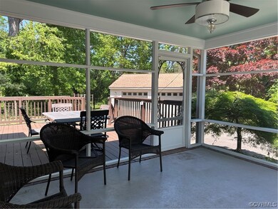 Screened porch opens to wrap deck