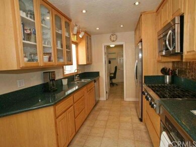 Plenty of counter space in this remodeled gourmet kitchen.  Nothing to do here...move in and get cooking!