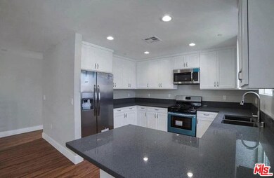 2303 Hauser Blvd, Los Angeles, CA 90016 - photo 5