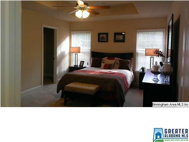 master bedroom with large walk in closet