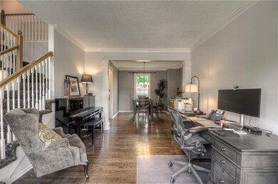 High end stairway carpet with gorgeous hardwoods. 