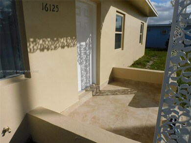 Entry way porch newly tiled.