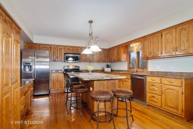 Large kitchen with granite countertops, SS applian
