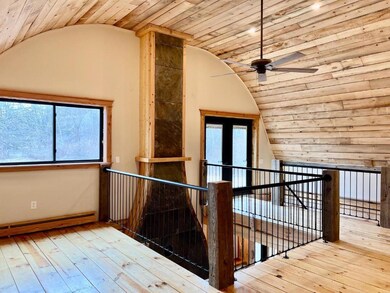 Loft sitting area with access to future deck over