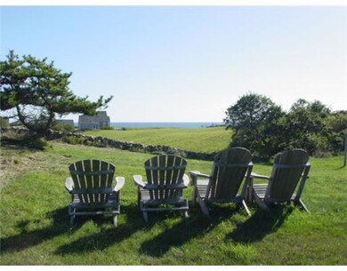 Exterior Front. The cape style cottage outdoor sit