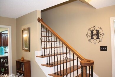 Oak & Iron staircase off of entry