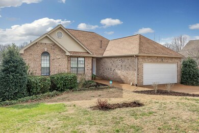 2 car garage and new landscaping to start off the showcase on this move-in ready home.
