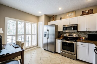 Beautifully updated kitchen with smudge proof Frig