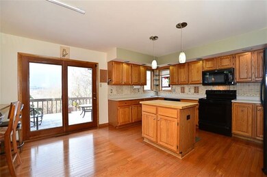SHINING HARDWOODS ENHANCE KITCHEN WITH NOT ONE BUT