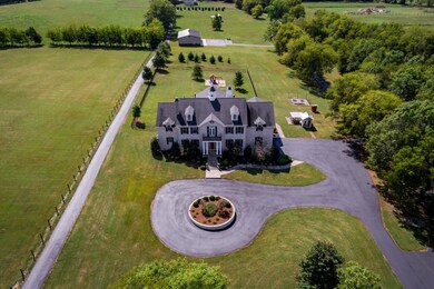 15.8 beautiful acres with 1 mile paved walking/jogging trail