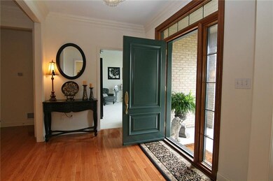 Setting a tone of gracious welcome...Hardwood floo
