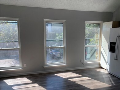 Sunny living area with new windows and sky lights.