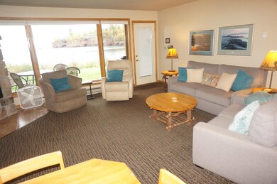 Living area featuring a water view