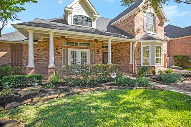 Beautiful brick elevation with a large front porch.