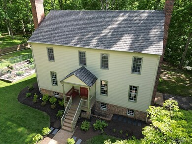 Front view with entrance to Basement under Front P