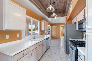 Kitchen with View Windows to Backyard