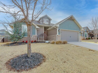 View of front of property featuring concrete drive