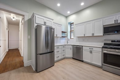 Brand NEW Kitchen that showcases sleek cabinetry,