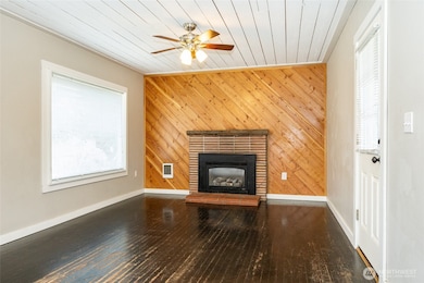 Large Living area with wood floors and gas firepalce