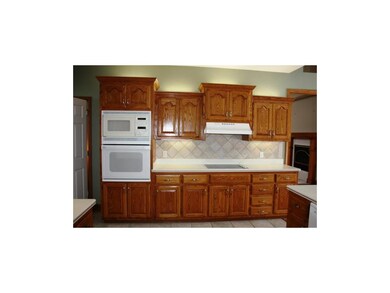 Built in oven, microwave, and smooth top range
