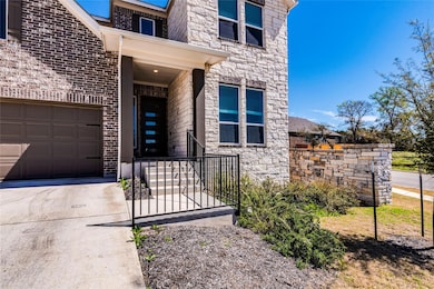 Property entrance with stone siding