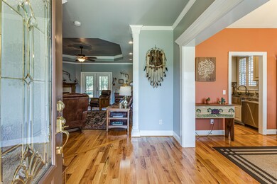 A large foyer opens to the Great Room and the Formal Dining Room to the right.  