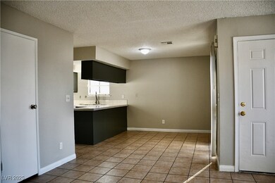 Kitchen light tile patterned floors, and light cou