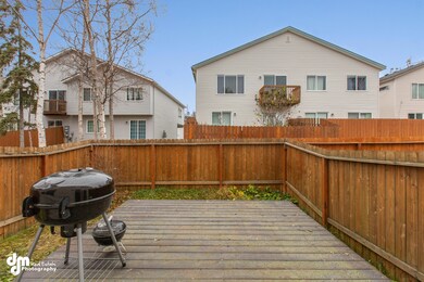Fenced yard with nice deck