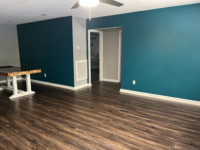 Extra large great room leading to a nice dining area