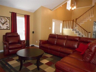 The living room at the entrance to the home.  Beau