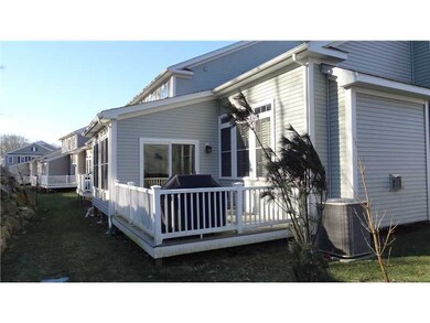 Exterior Back. Adjoining deck with gas connection