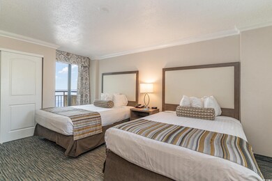 Private Bedroom featuring 2 queen beds