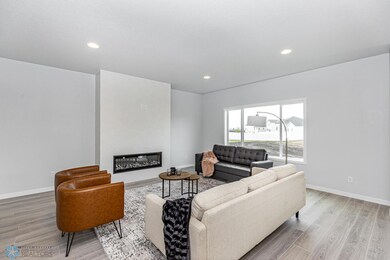 Living Room w/ Tile Surround Fireplace