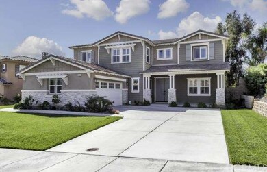 2 Car garage, private driveway and front patio are